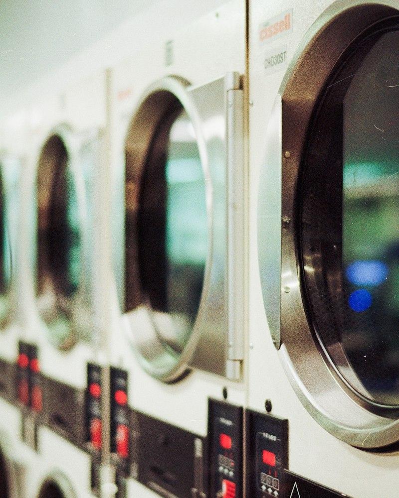 A row of modern washing machines